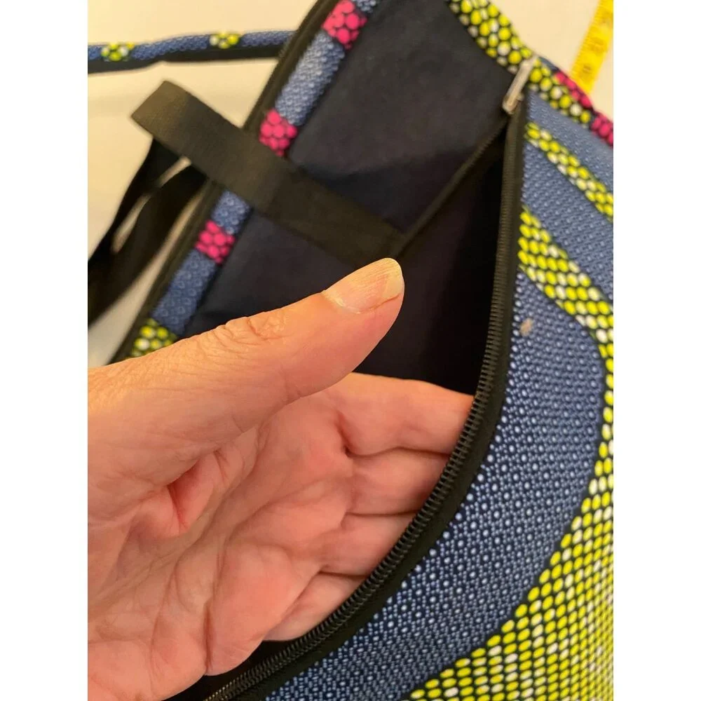 Village of Hope Off the Street Laptop Bag With Shoulder Strap Blue Yellow Pink